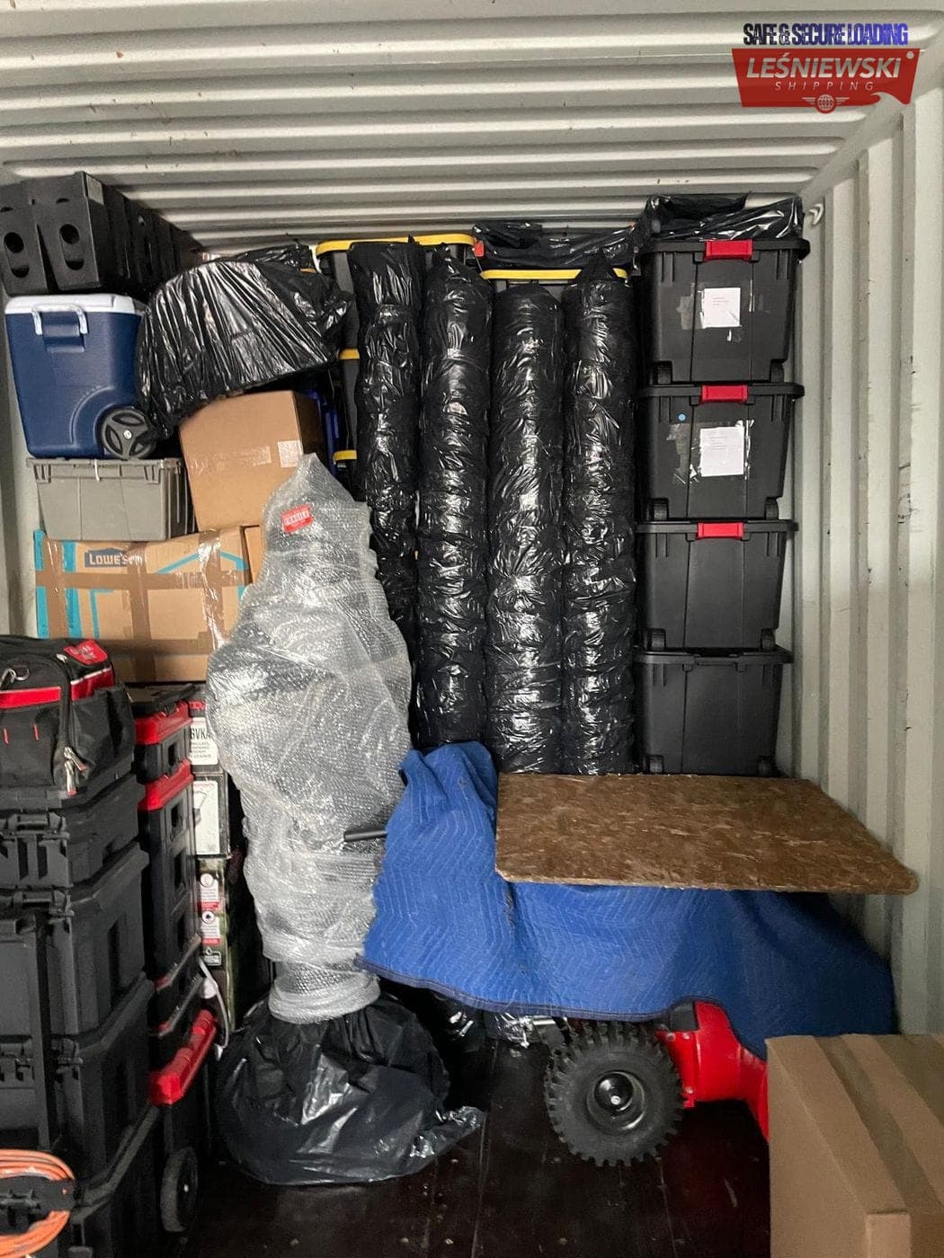Household goods in a container — boxes, totes and home equipment