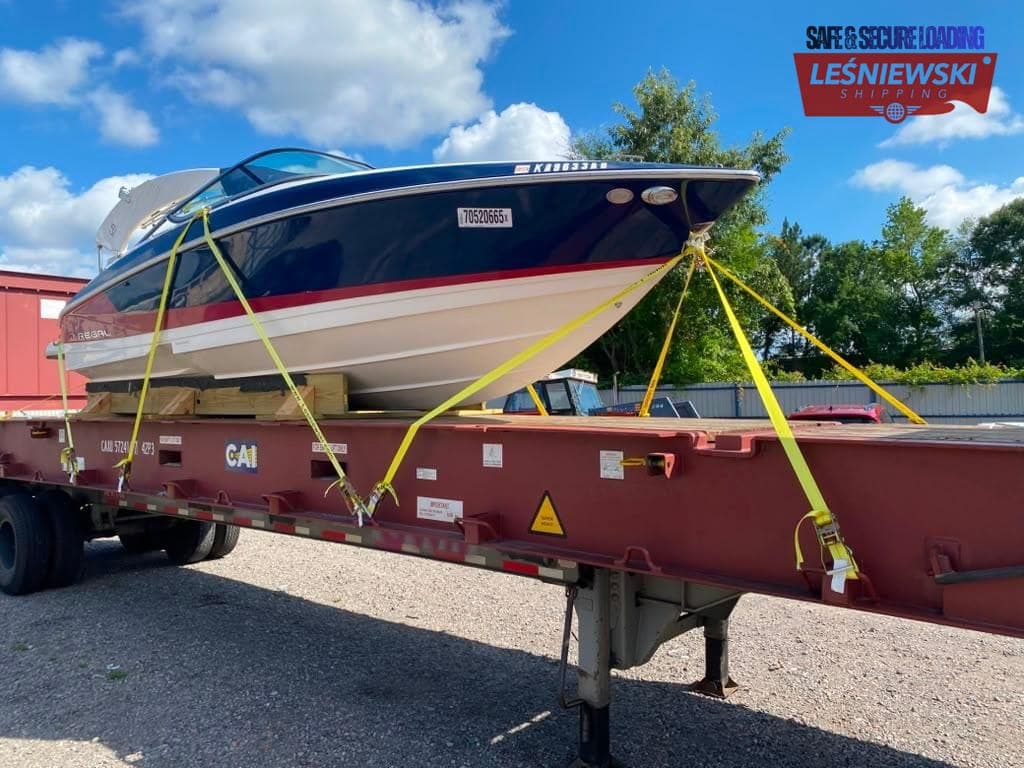 Regal motorboat on a flat rack platform — boat shipping from the USA to Poland